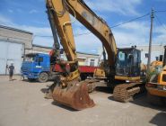 Экскаватор гусеничный Caterpillar 320DL 1