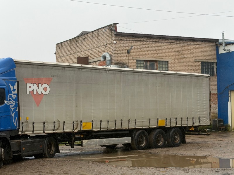Полуприцеп шторный Krone SD