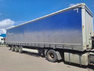 Полуприцеп шторно-бортовой Krone SD 0
