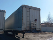 Полуприцеп шторно-бортовой Krone SD 0
