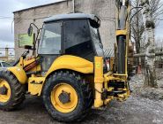 Экскаватор-погрузчик New Holland B115B 1 Экскаватор-погрузчик New Holland B115B 1